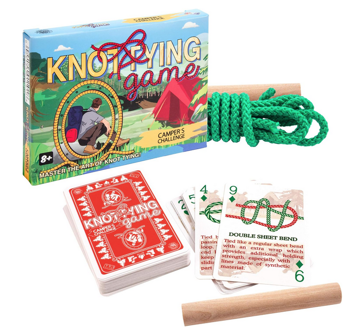 Knot tying cards, tying bars and rope set out in front of the box they come packaged in.