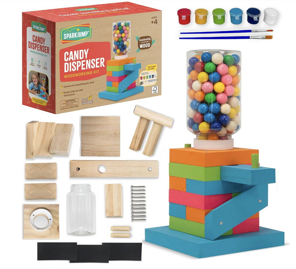 All of the components included in the Candy Dispenser Woodworking Kit , a picture of the completed project all painted and filled with bubblegum balls and the box it all comes packaged in featured in the top left corner. 