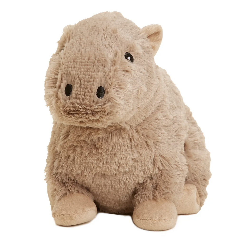 Light tan Capybara weighted stuffed animal facing forward. 