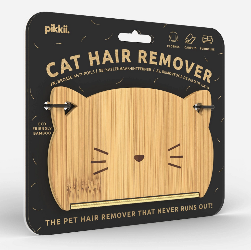 The Cat Hair Remover bamboo pet hair remover tool shaped like a cat head. 