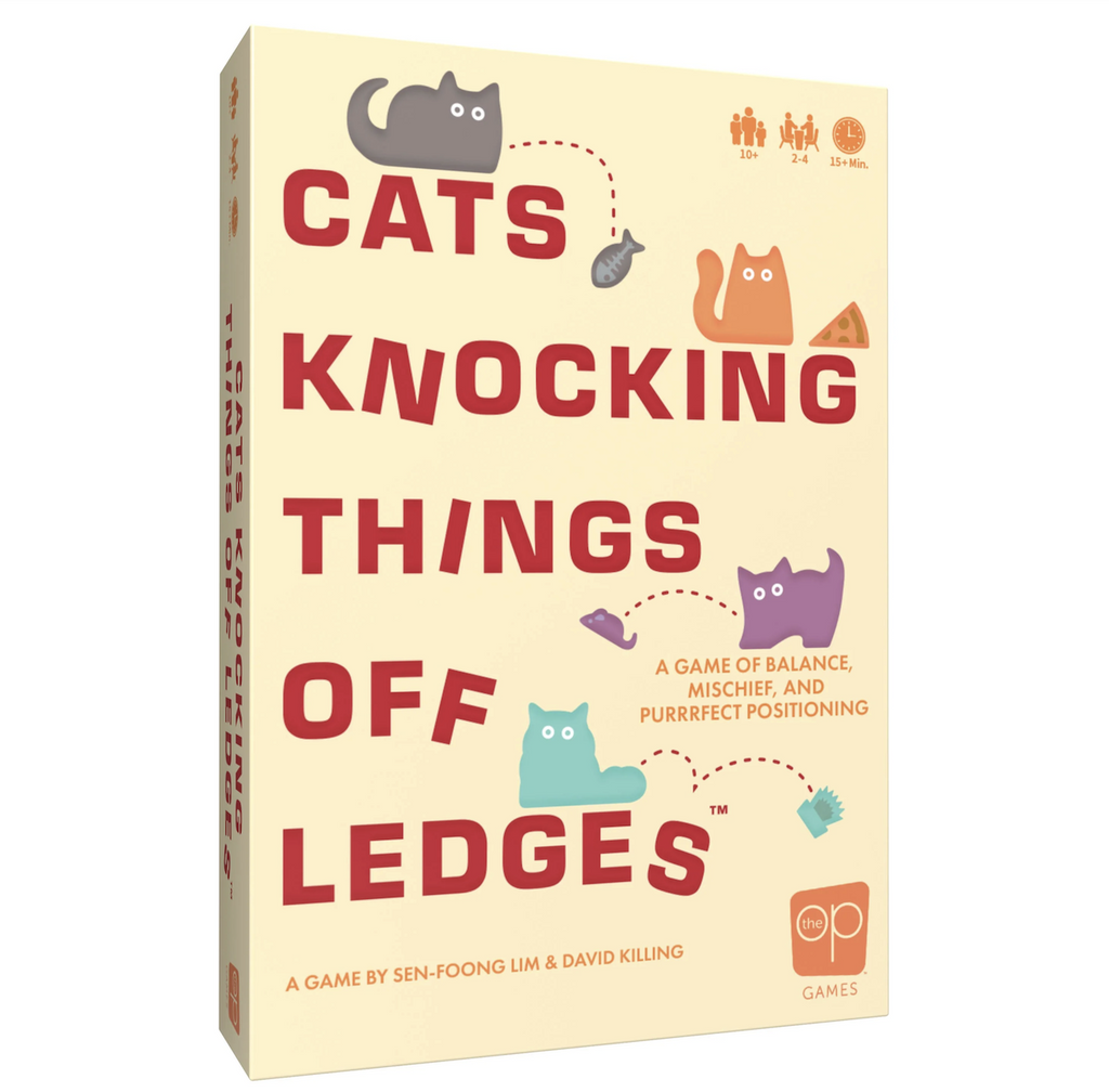 Cover of the box for the game Cats Knocking Things Off Ledges, with illustrated kitties knocking objects around. 