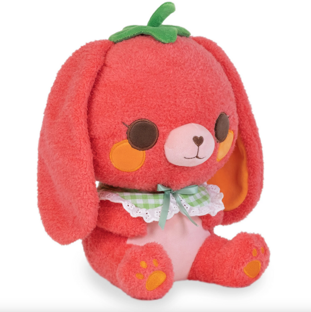 Side view of Cheerie the Tomato Bunny with long floppy ears and a cute kawaii face.
