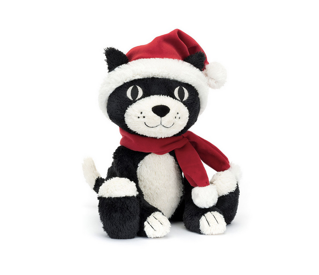 Plush tuxedo cat wearing a santa hat and scarf.