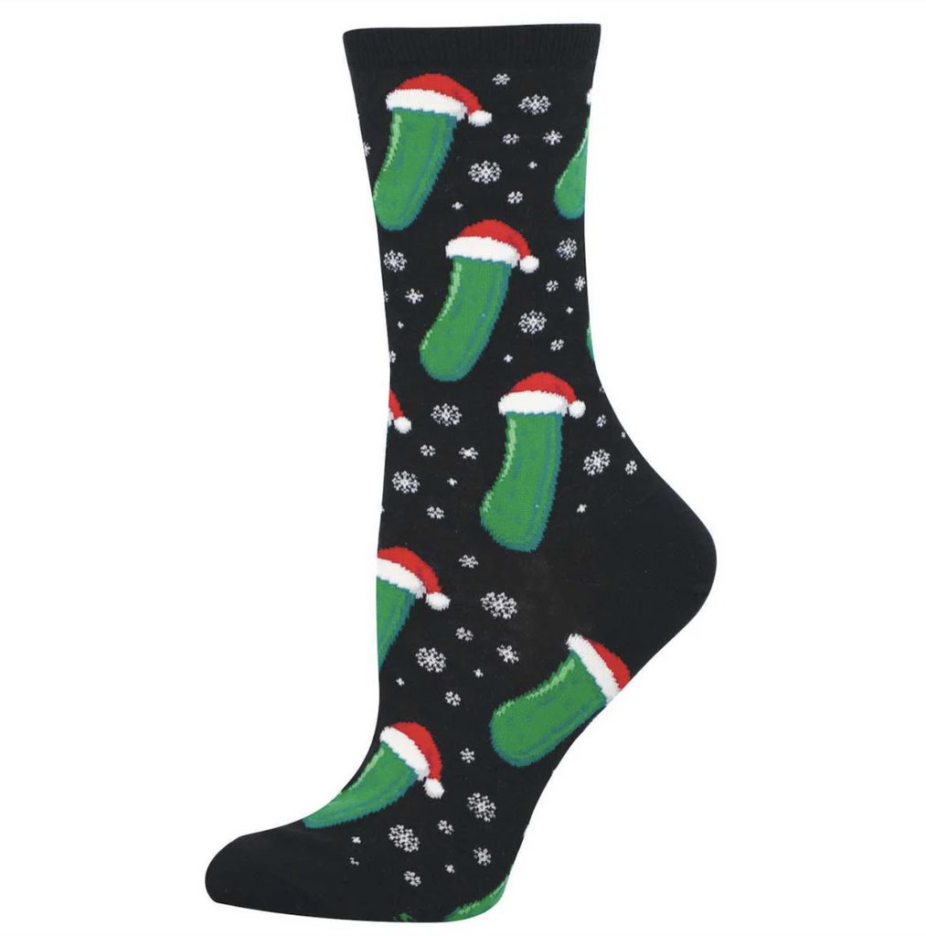 Black socks with bright green pickles in Santa hats and snowflakes. 