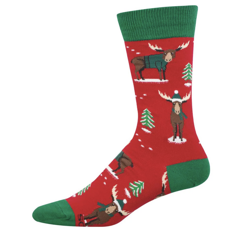 Red socks with green trim and Moose wearing sweaters, scarves and cozy hats along with pine trees. 