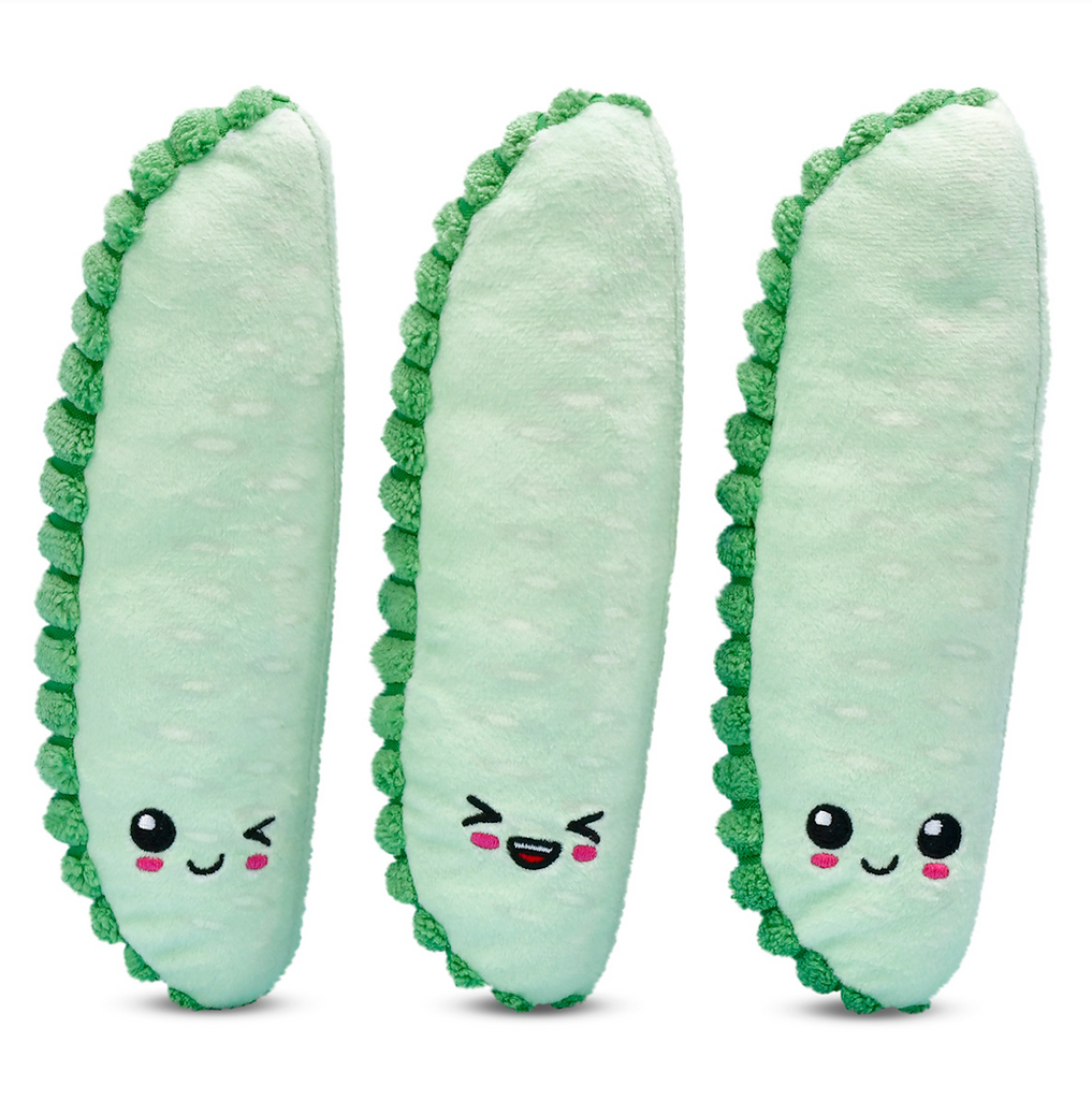 Three plush Claussen Kosher Dill pickle spears. 