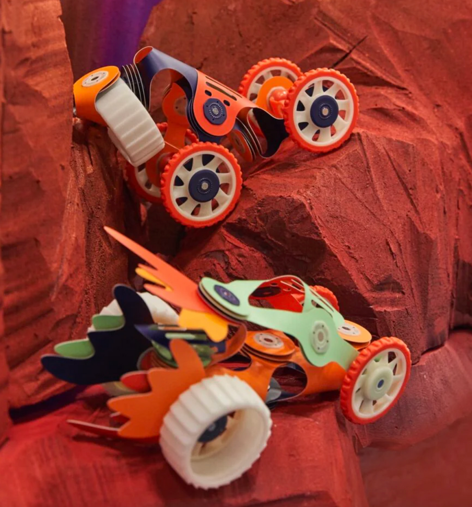 Two different space vehicles built from the Clixo Mars Rovers set with glow in the dark wheels. 