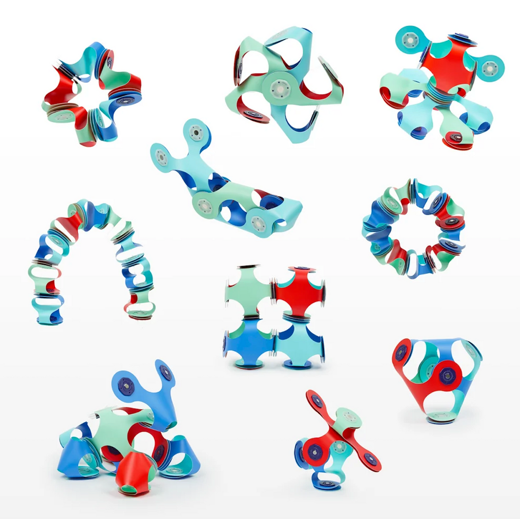 Colorful, flexible magnetic pieces from the Tiny & Mighty Marine set arranged in different shapes and creations. 