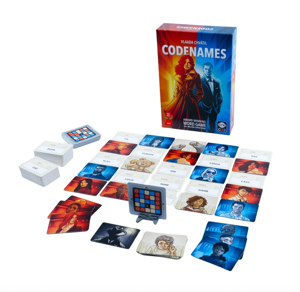 Character cards and clue cards from Codenames set up for game play. 