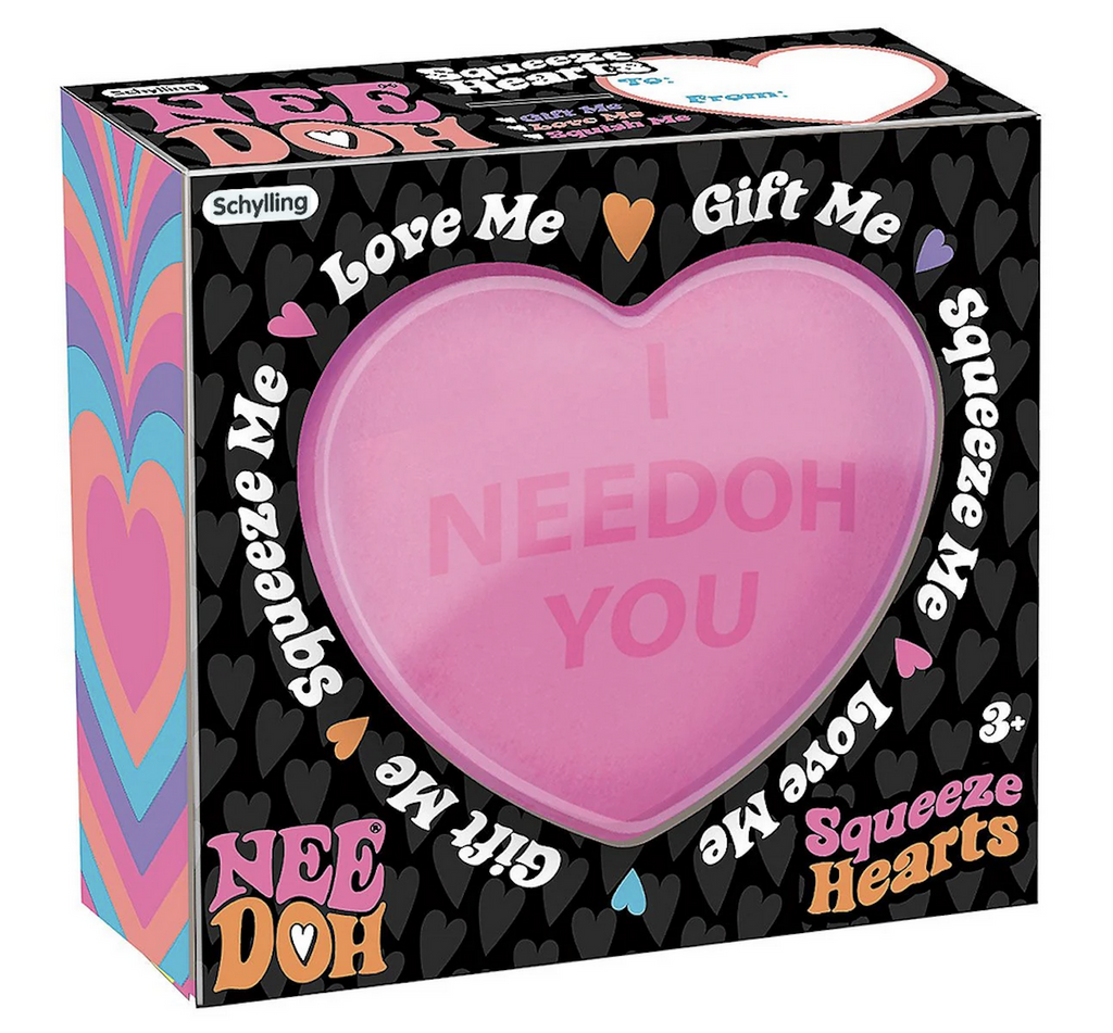 Pink heart shaped color changing Nee Doh squish toy packaged in a box with a window that shows the message written on the Nee Doh that reads "I NeeDoh You" 