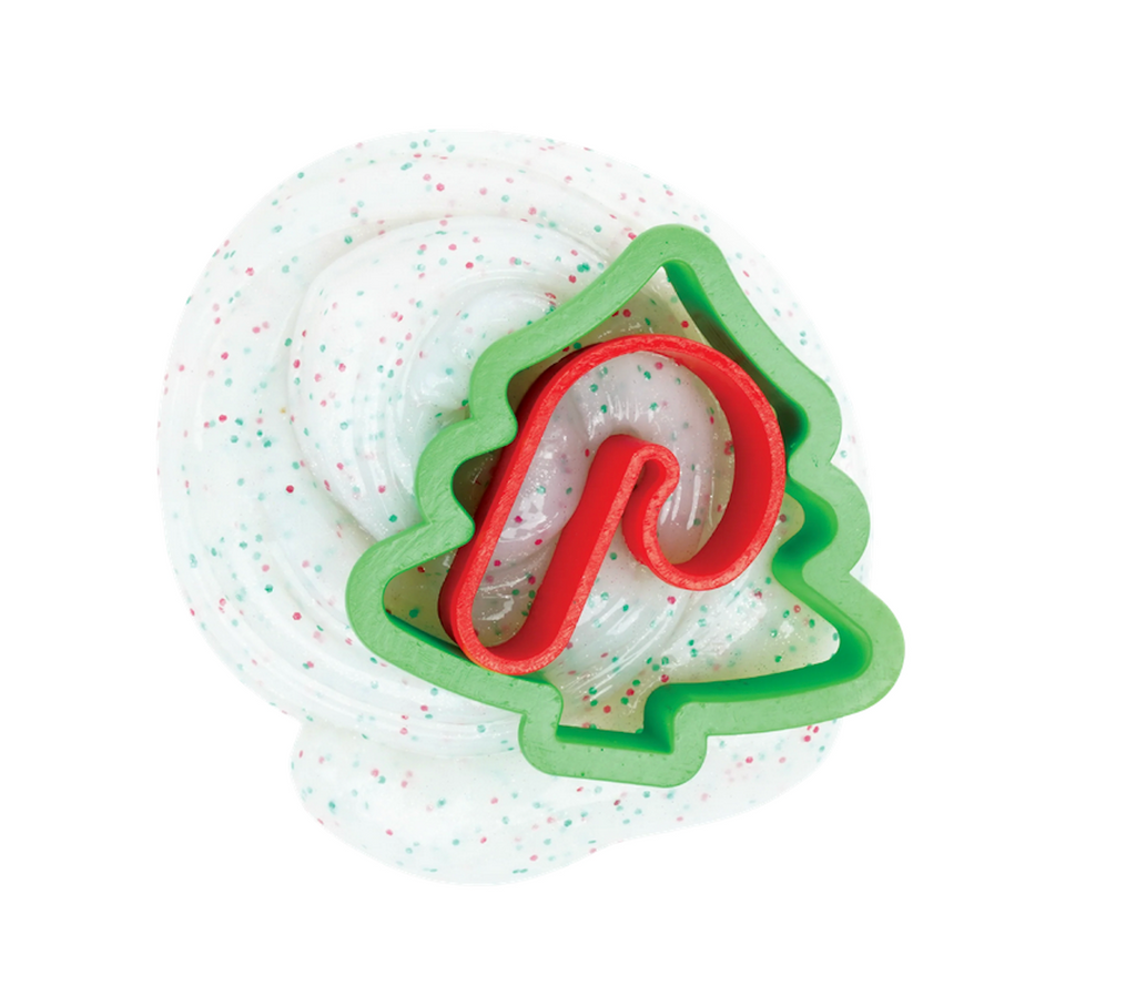 White putty with red and green sprinkles and cookie cutters in the shape of a candy cane and Christmas tree. 