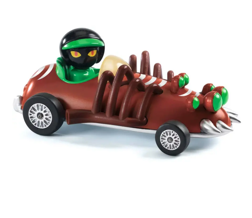 Brown diecast car with spider legs on the front and the driver wearing a black and green helmet.