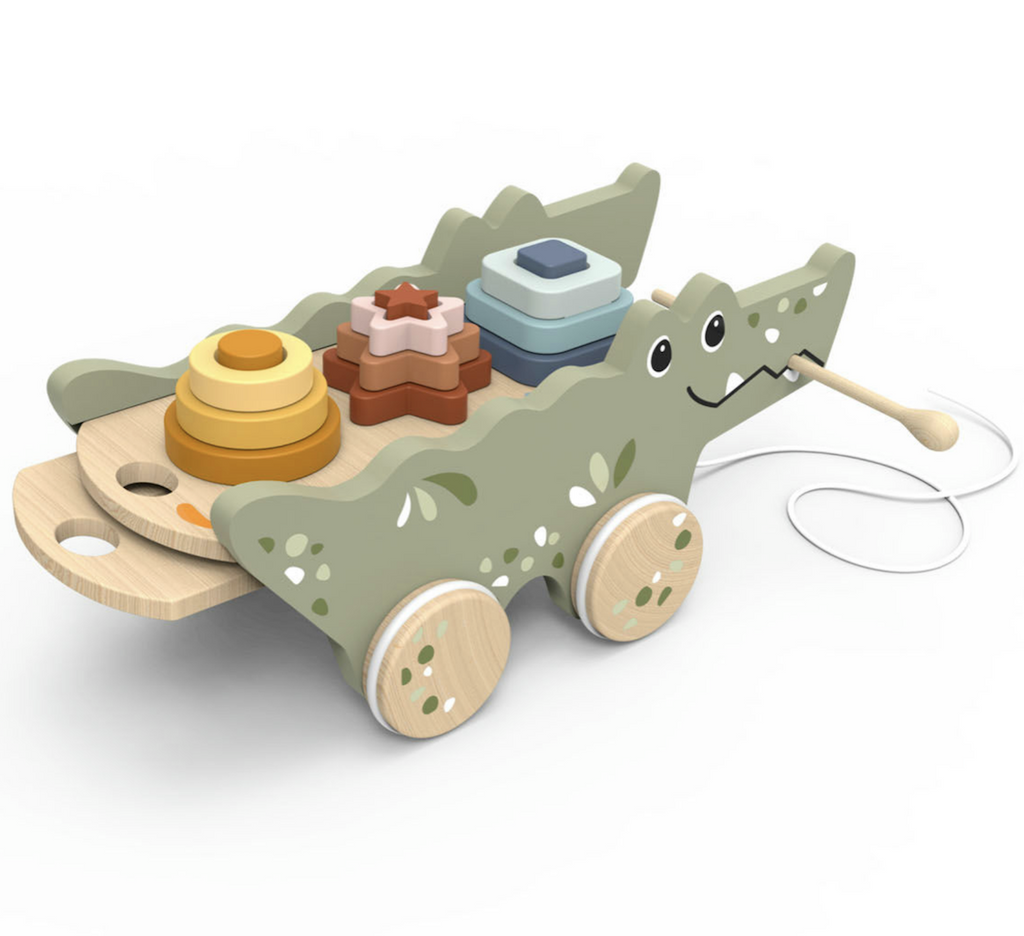 Wooden pull toy shaped like a crocodile with a shape sorter and stacking toy on the top. 