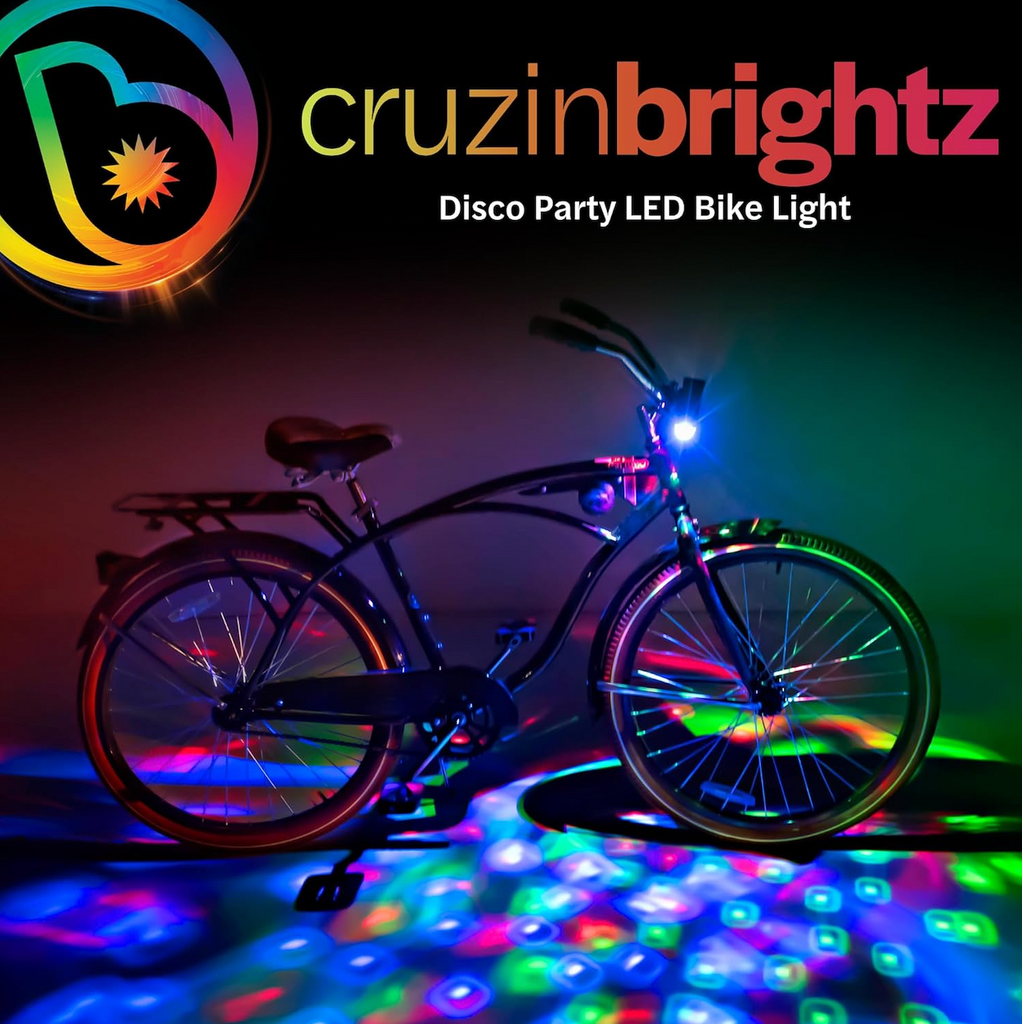 Bicycle with LED lights on a dark background, featuring the Cruzin Brightz creating a multicolored light show. 