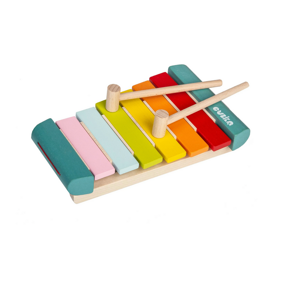 A close up of the Cubika Xylophone and wooden mallets. Each wooden bar is painted a different color. 