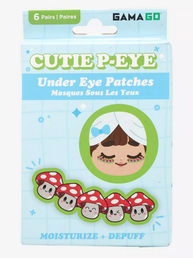 Light blue box with illustrated image of the mushroom under eye patches and a young lady using them.