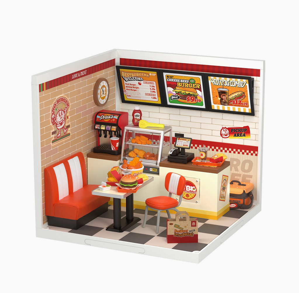 Close up view of the miniature burger shop with all of the miniature accessories that come in the kit. 