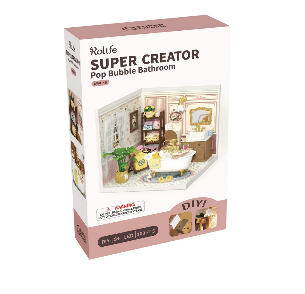 White and pale pink box with color pictures of the Pop Bubble Bathroom Super Creator model assembled with all of the miniature accessories. 