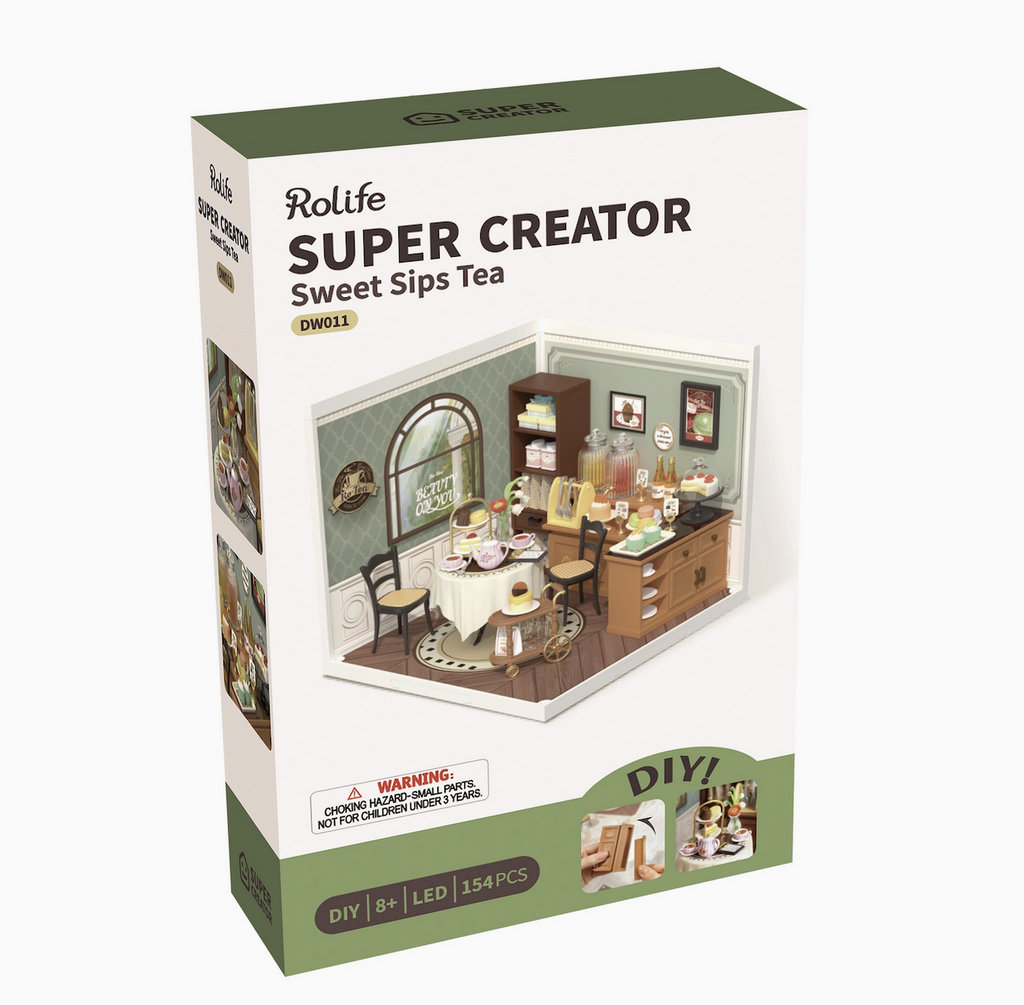 Super Creator Sweet Sips Tea miniature house kit packaged in a box with pictures of the model once it is assembled. 