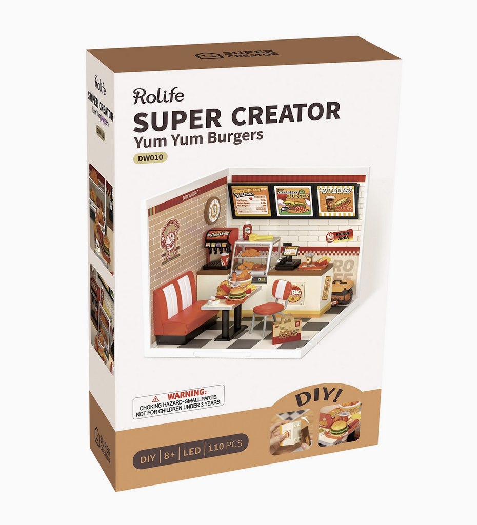 Yum Yum Burgers Super Creator kit packaged in a box with a picture of the miniature burger shop. 