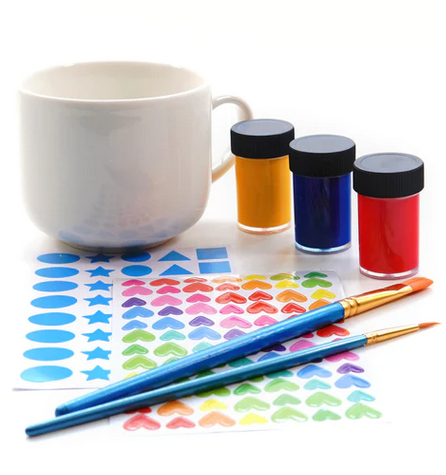 Everything you need to decorate your own one of a kind cup. Kit includes: Cup. Brushes. Ceramic paint and shape stickers.
