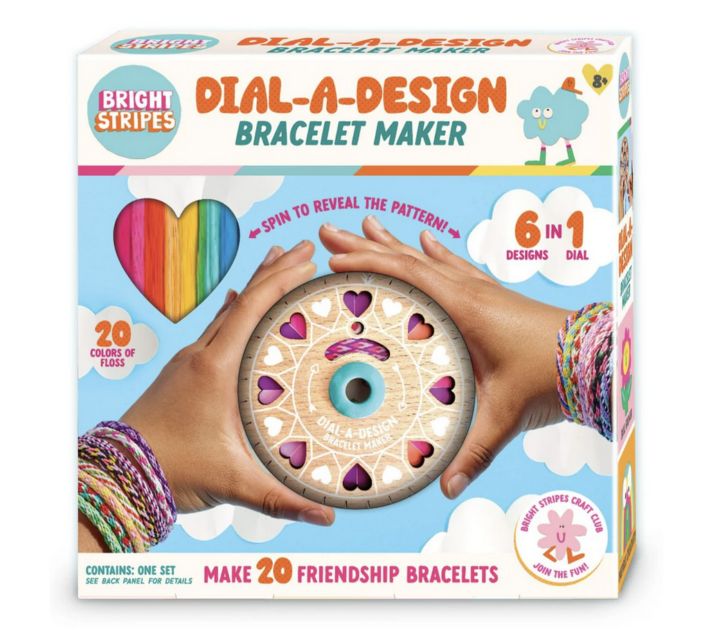 Dial a Design Bracelet Maker packaged in a box with a picture of the dial set up to make a bracelet with a peek at all the colors of floss included to make the friendship bracelets. 