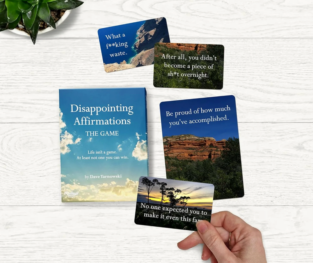Disappointing Affirmations game cards spread out for game play. 