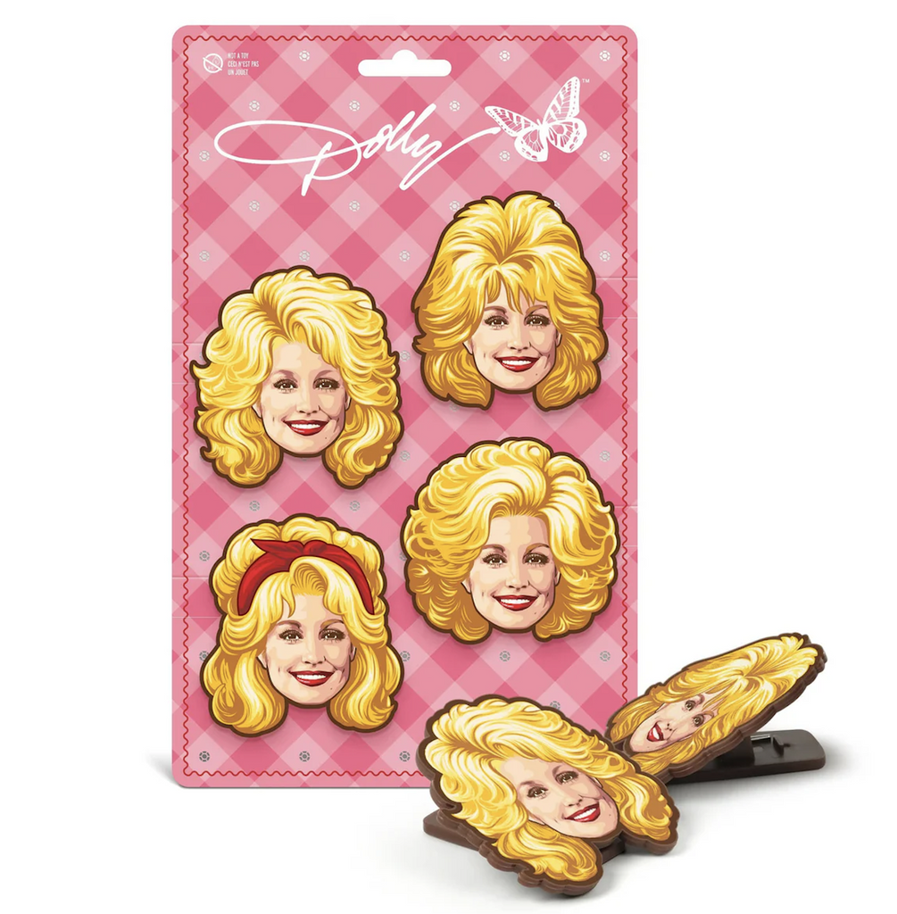Set of four chip clips in the shape of Dolly Parton with different hairstyles attached to a pink gingham backing card with foil rhinestone accents. 