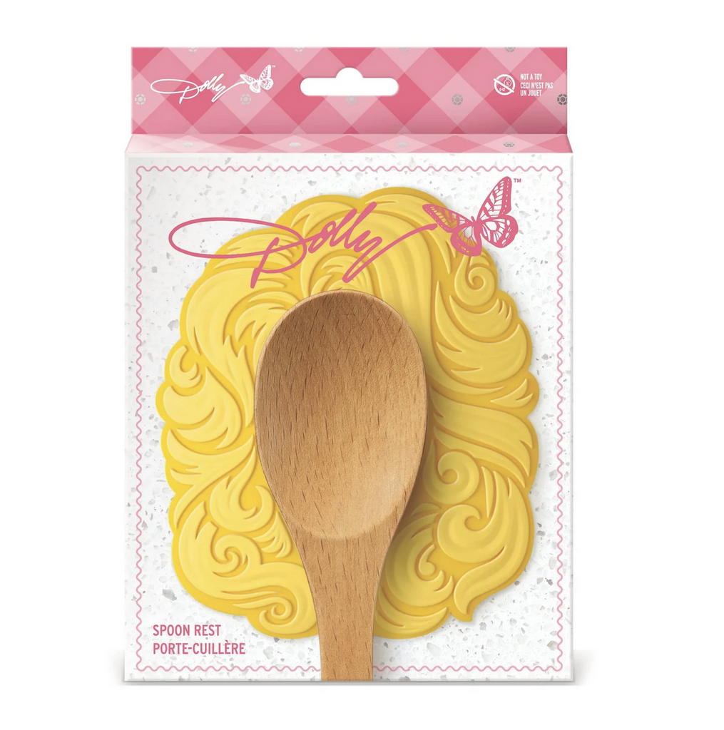 White box with pink gingham box that has foil-stamped rhinestones with a picture of Dolly Parton's iconic hair in a silicone spoon rest. 