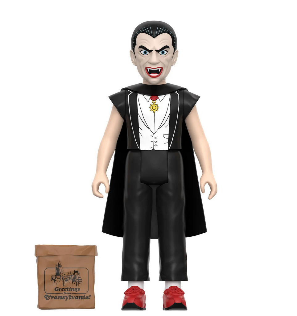 Close up of Dracula Halloween Kids Reaction Figure with brown paper treat bag accessory. 