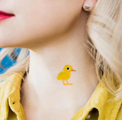 Duckling temporary tattoo applied to neck. 