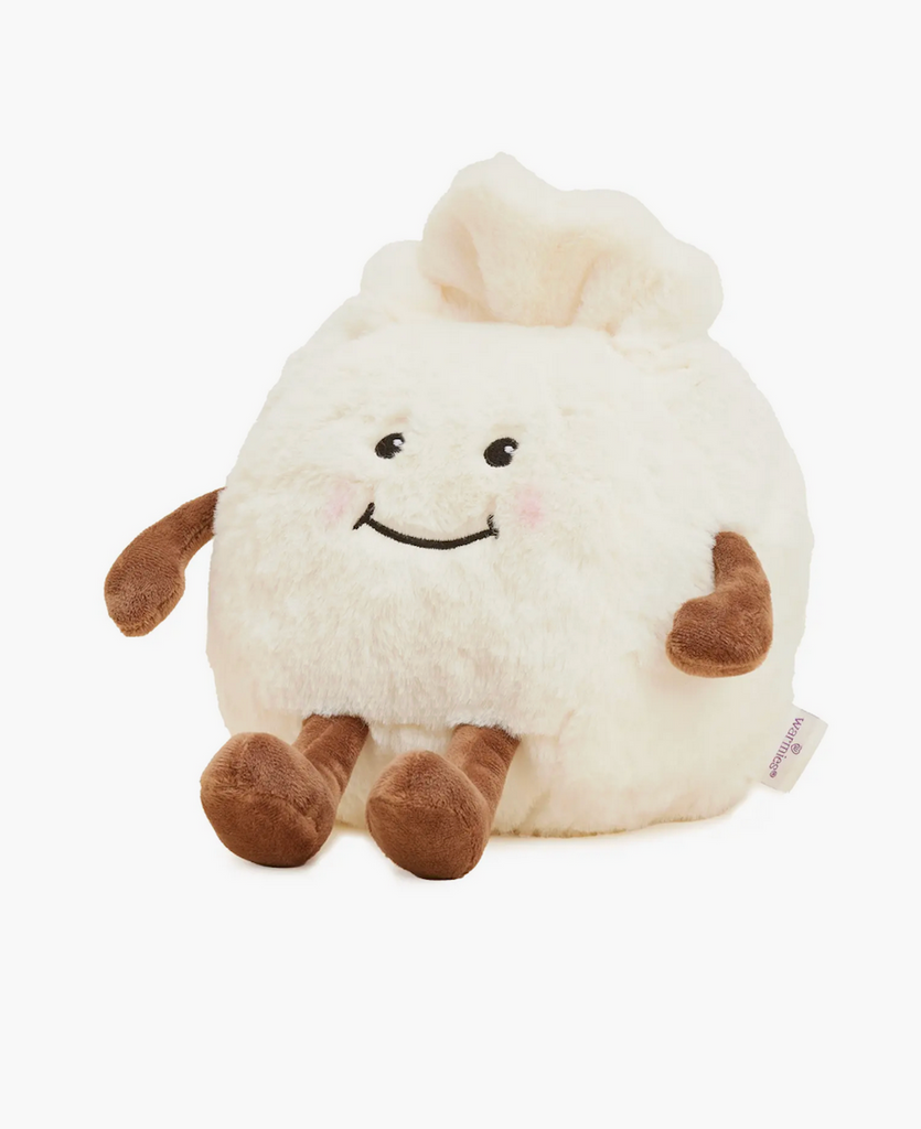 Weighted stuffed animal resembling a dumpling with a cute smiling face. 