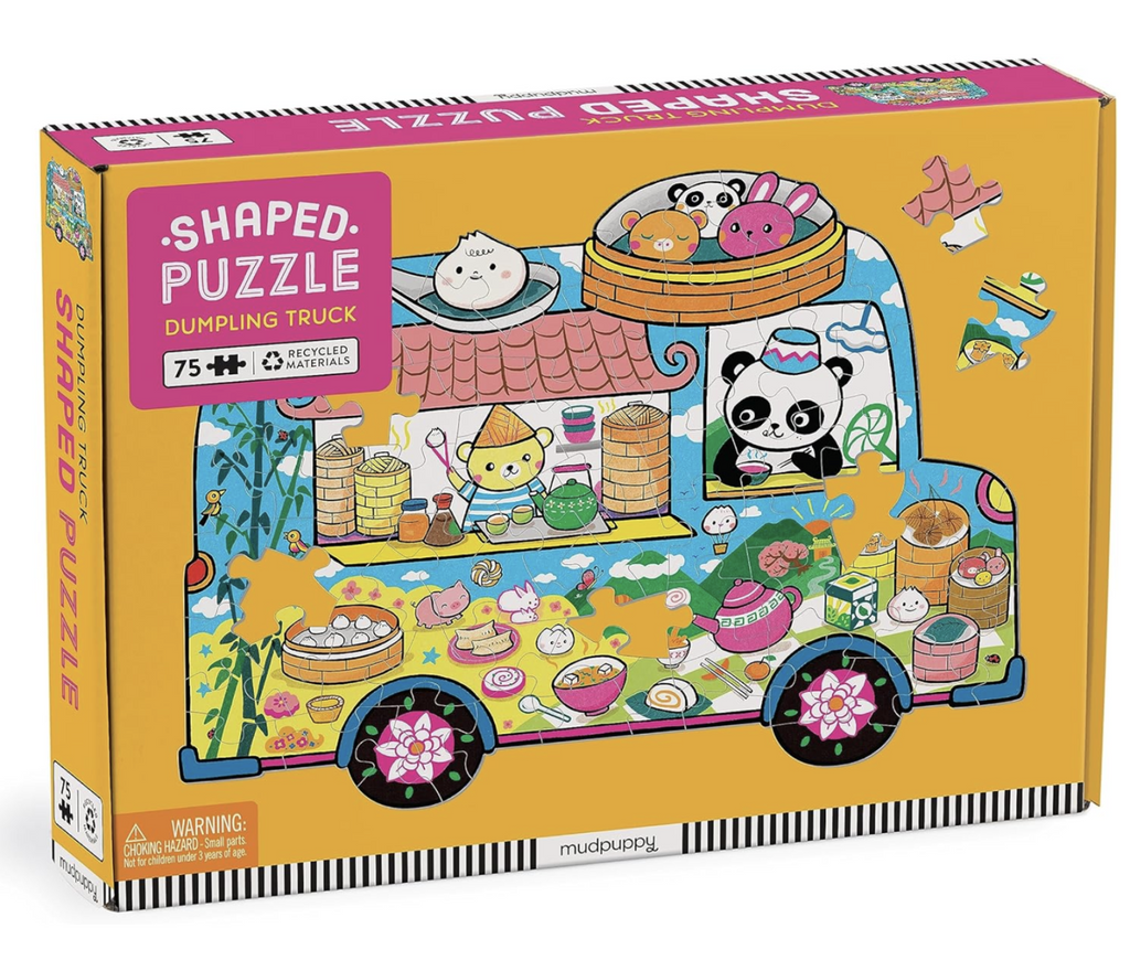 Bright yellow box with the completed Dumpling Truck puzzle pictured. 