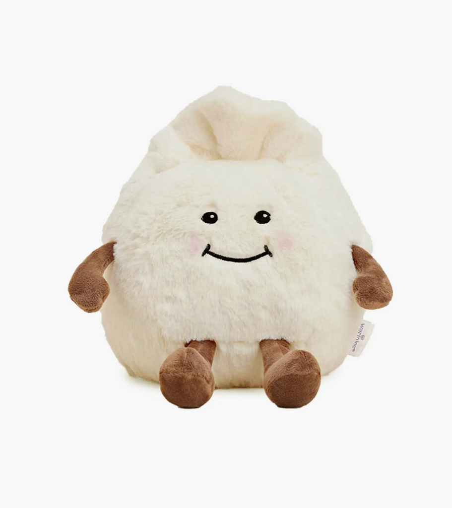 Dumpling Warmies weighted kawaii food plush with fluffy cream colored fur and brown arms and legs. 