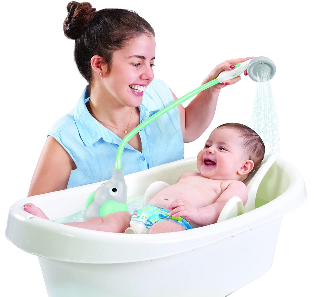 A parent giving their baby a bath using the Elephant Baby Bath Shower Head. 