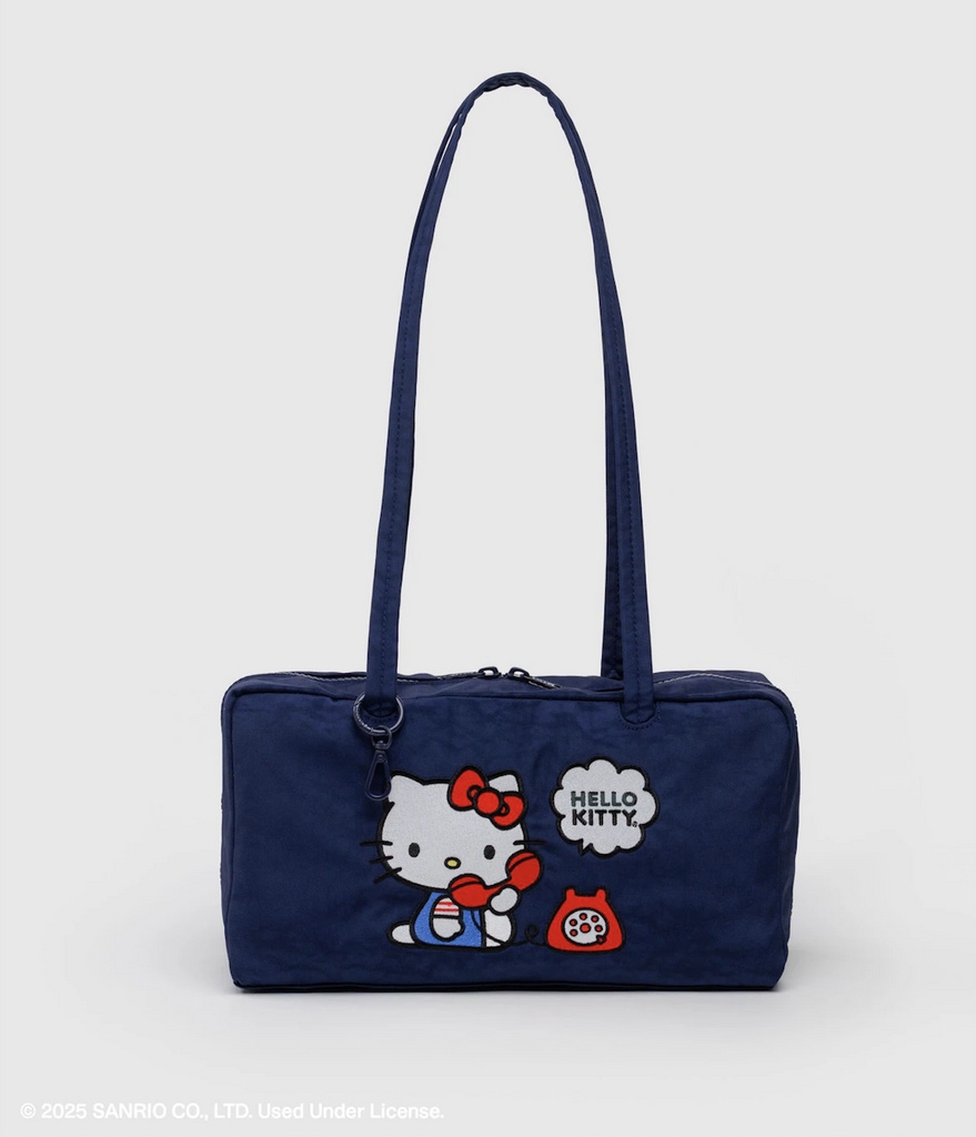 Navy blue bowler style bag with classic Hello Kitty on the telephone embroidered on the side. 