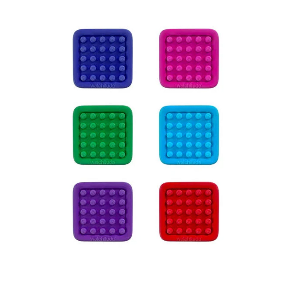 Assortment of colorful square silicone Endless Bubble Wrap fidget toys. The colors are purple, green, dark blue, pink, light blue and red. 