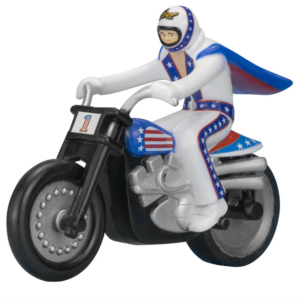 Close up of the mini stunt cycle with Evel Knievel in his white jumpsuit with stars and stripes accents.