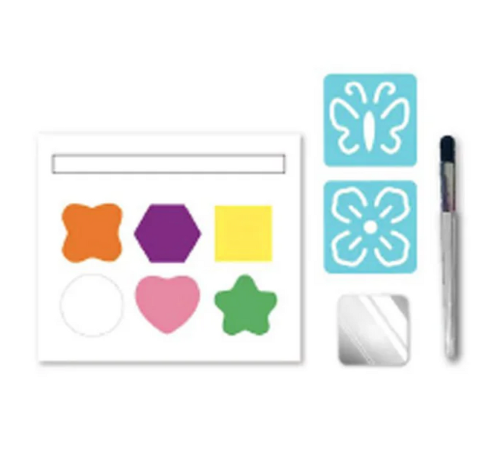 The contents of the Face Painting Kit with stencils, a brush, a mirror sticker and six colors of face paint. 