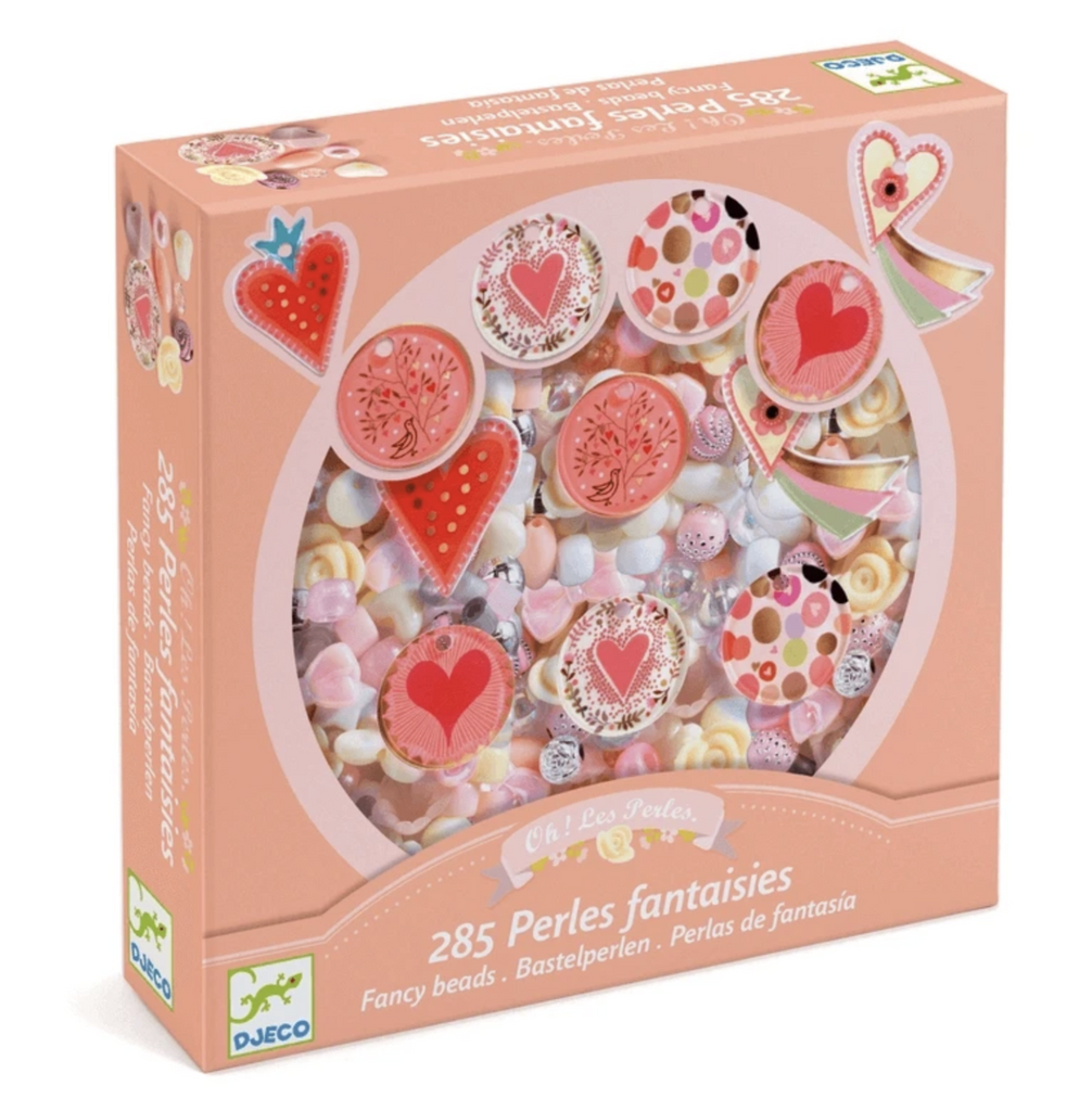 Box with clear window showing assortment of beads within the Fancy Bead Set Hearts. 