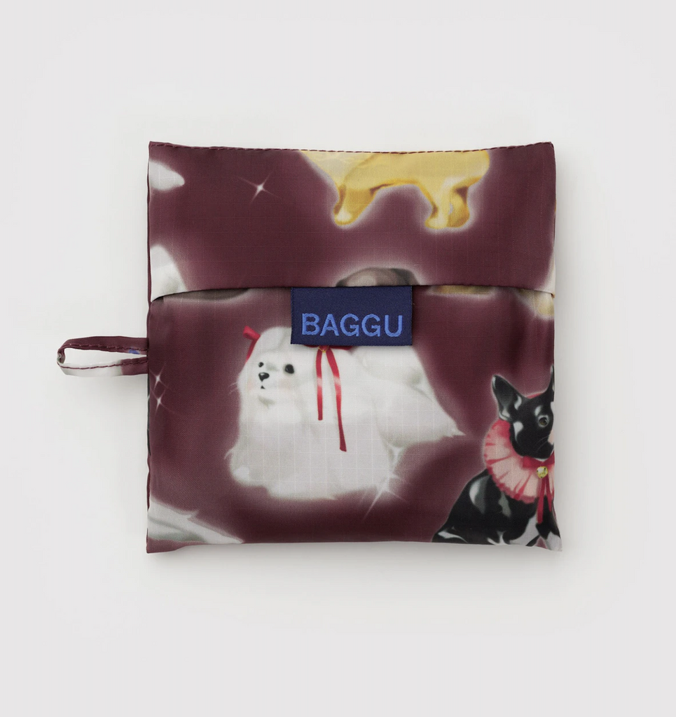 Fancy Dogs Baggu standard bag folded into it's flat  5x5 storage pouch. 