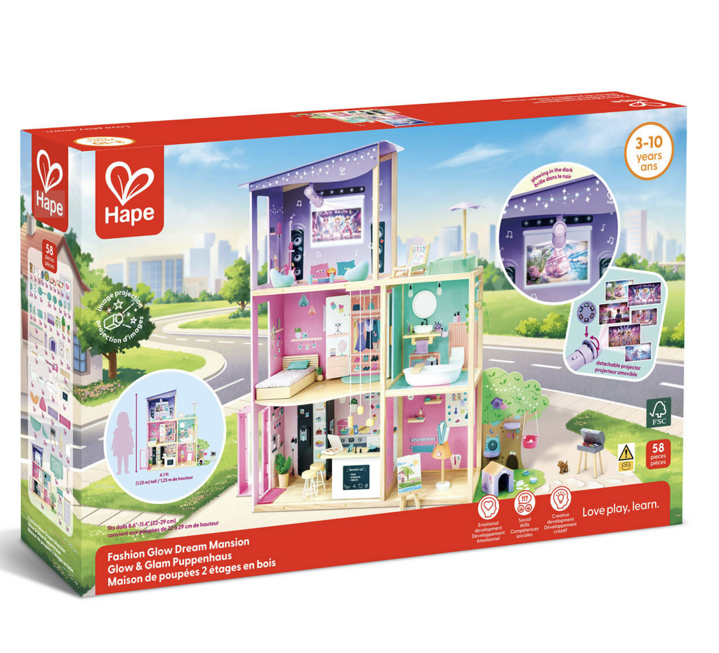The large box holding the Fashion Glow Dream Mansion with a picture of the dollhouse fully furnished inside and out. 
