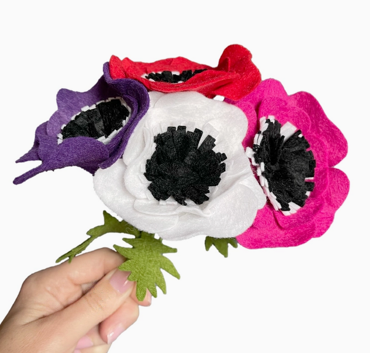 Completed Anemones felt flowers bouquet in purple, white, red, and fuschia. 