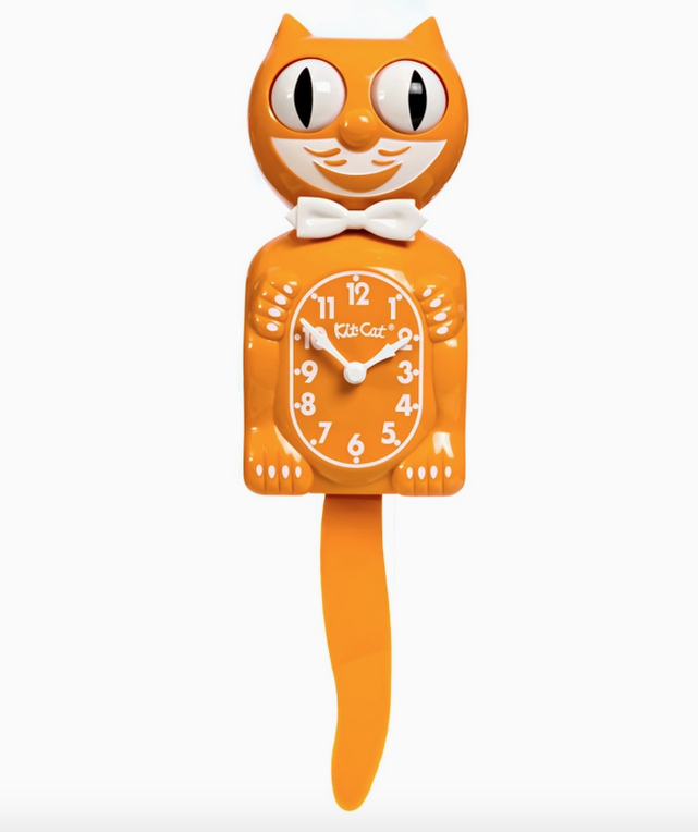 Bright orange colored Ki Cat wall clock with white bowtie, moving eyes and wagging tail. 
