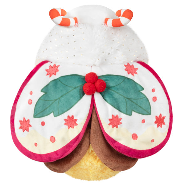 Top view of Festive Moth Mini Squishable showing it's wings adorned with holly leaves. 