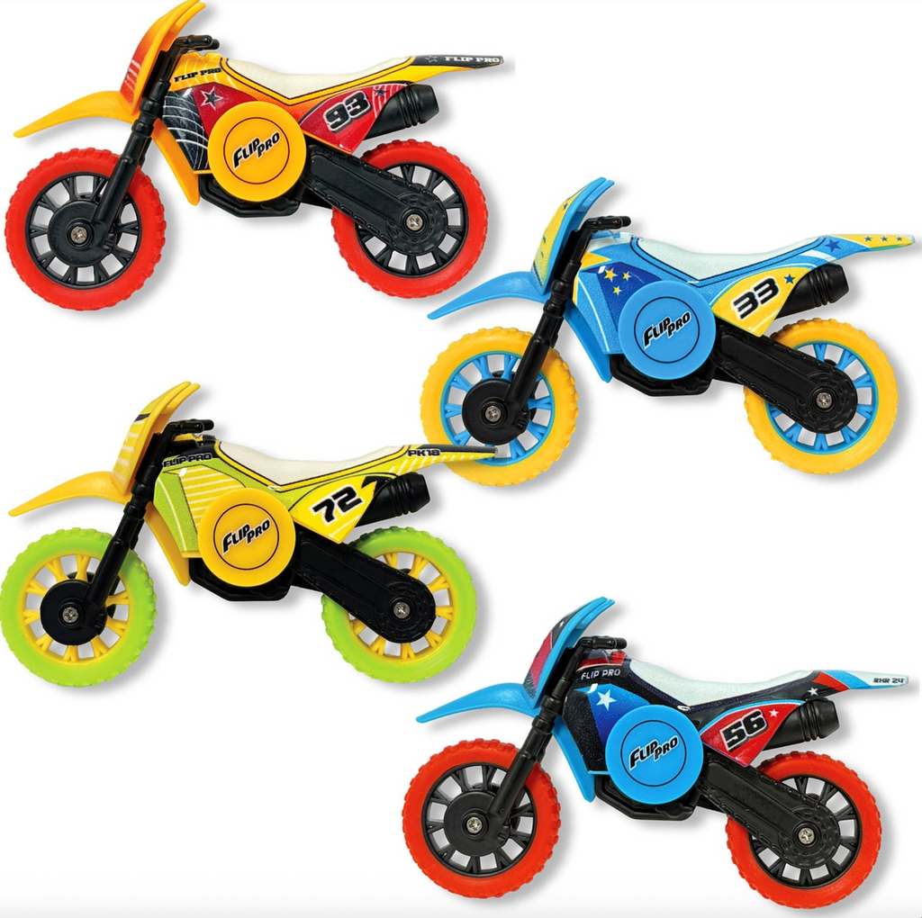 Four assorted colorful Flip Pro Spin Bikes toy motorcycles on a white background. 