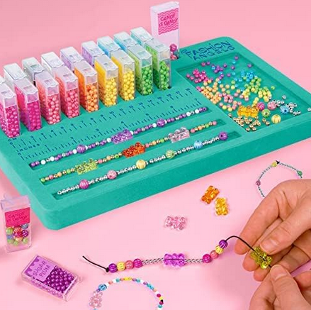 This bead collection includes 2500+ assorted color, metallic beads and gummy bear beads that are perfect for bracelets, necklaces and more. With flip top bead cases and a handy beading tray, there's endless design possibilities. Use the easy to pour containers and beading station to plan out your chic designs.