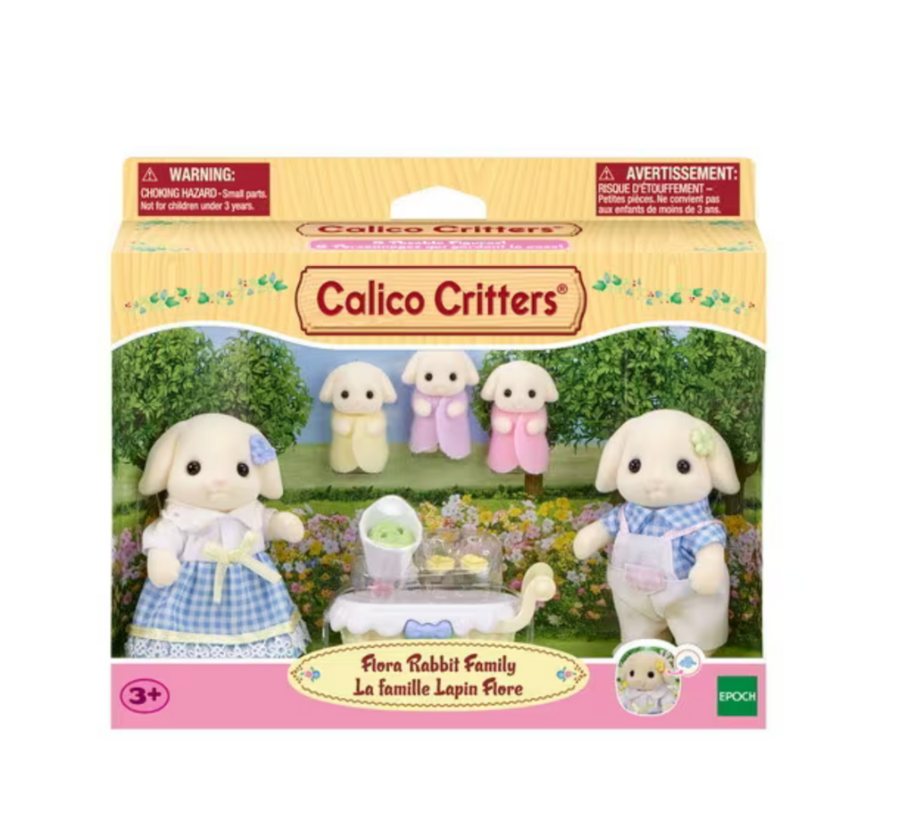 Calico Critters Flora Rabbit Family figures in their display box.
