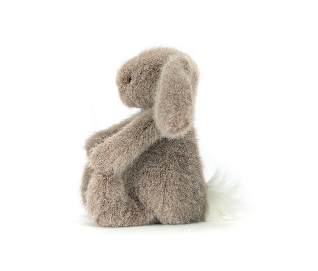 Fawn Flofflet Bunny stuffed animal viewed from the side. 