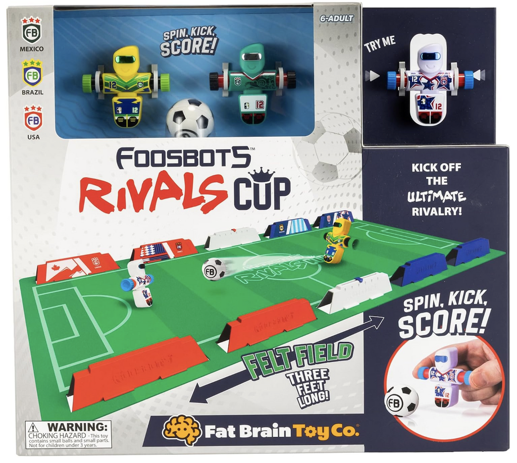 Foosbots Rivals Cup packaged in a box with clear windows that show the Foosbots with international themed markings and a soccer ball. Also featuring a picture of the felt field with barriers set up to keep the ball in play. 